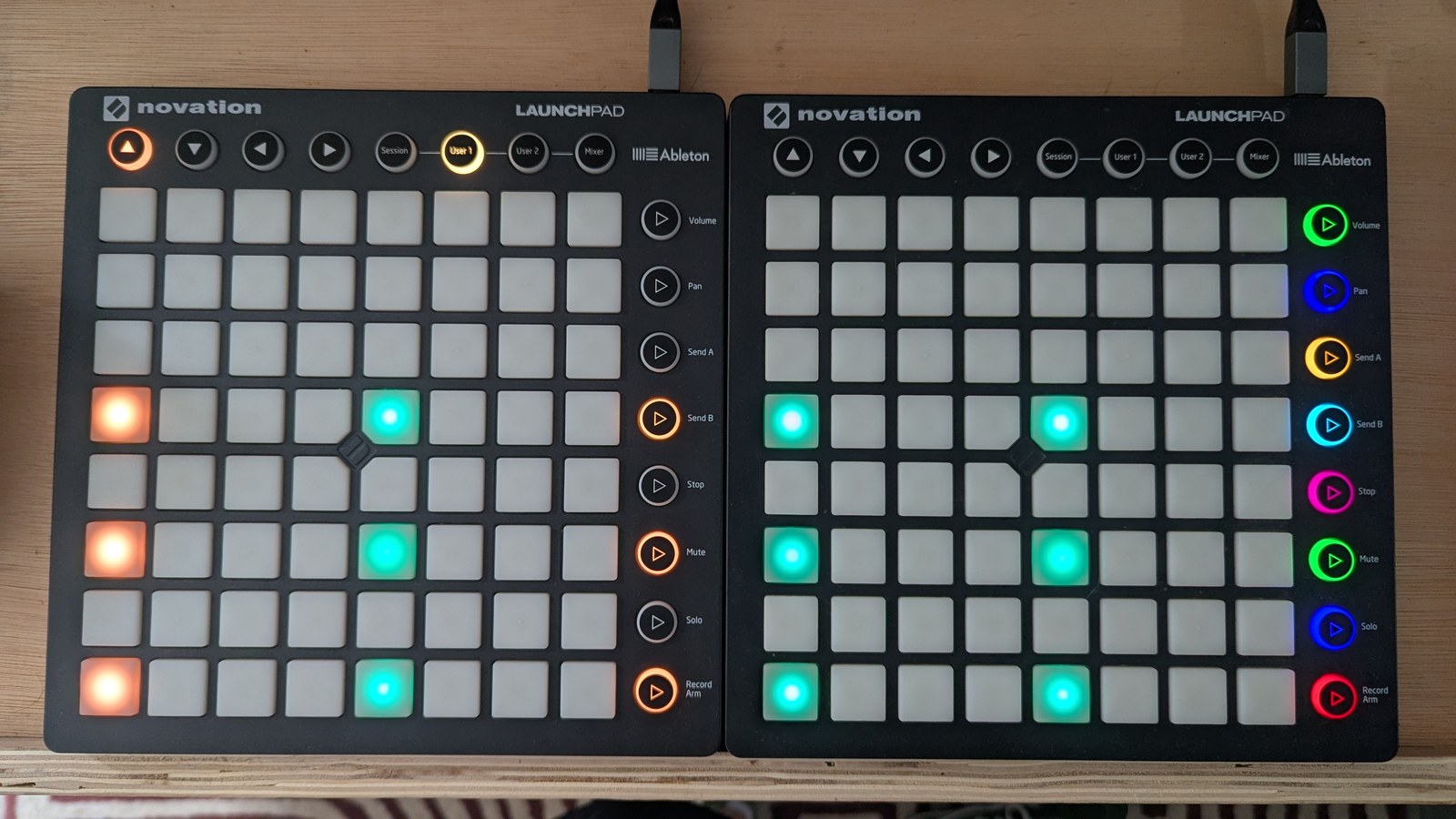 The same three rows of trigs, now with the row buttons lit orange, and the step 1 pads washed out where the playhead sits, photographed on the hardware